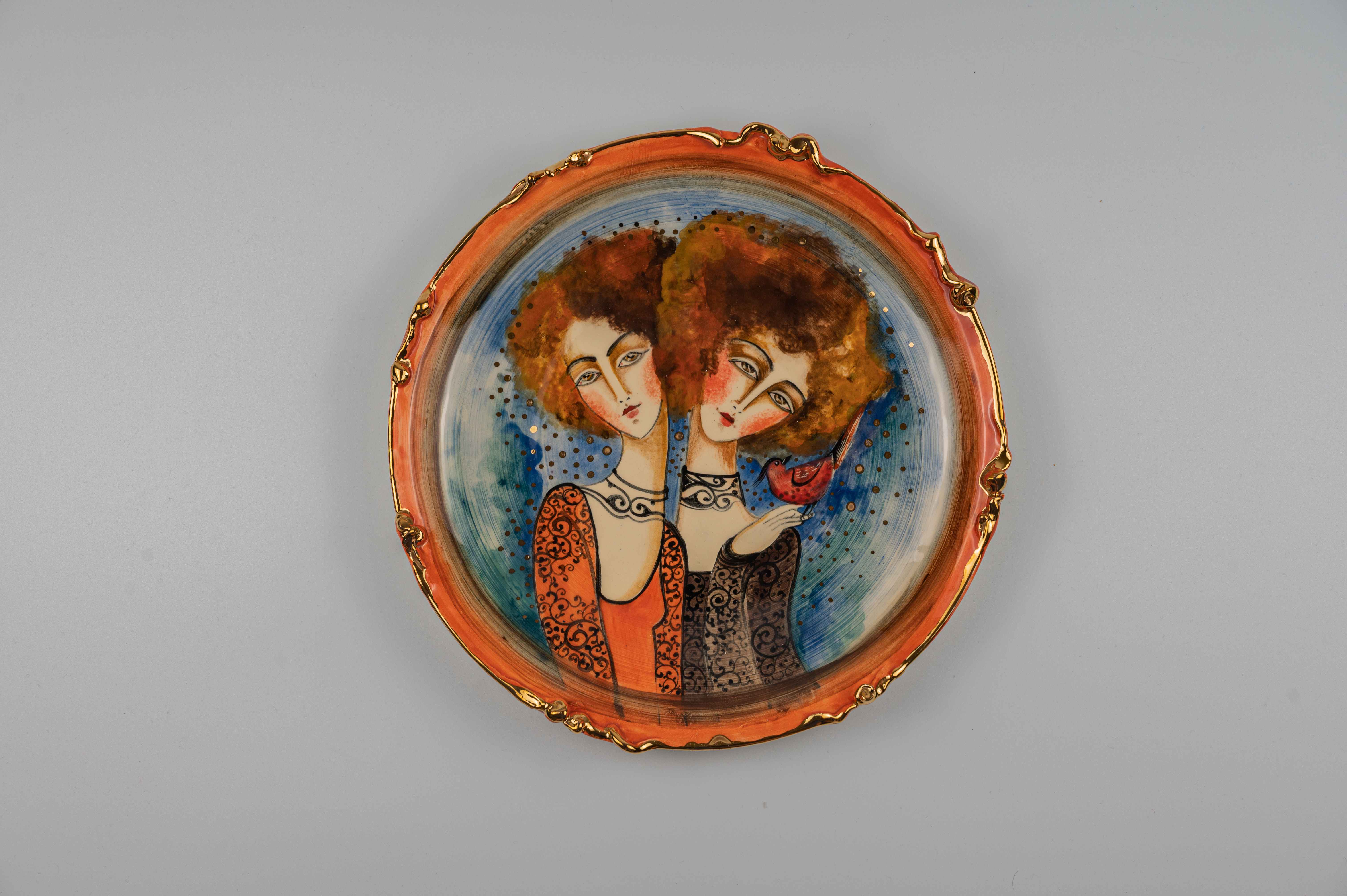 Ceramic plate with portraits