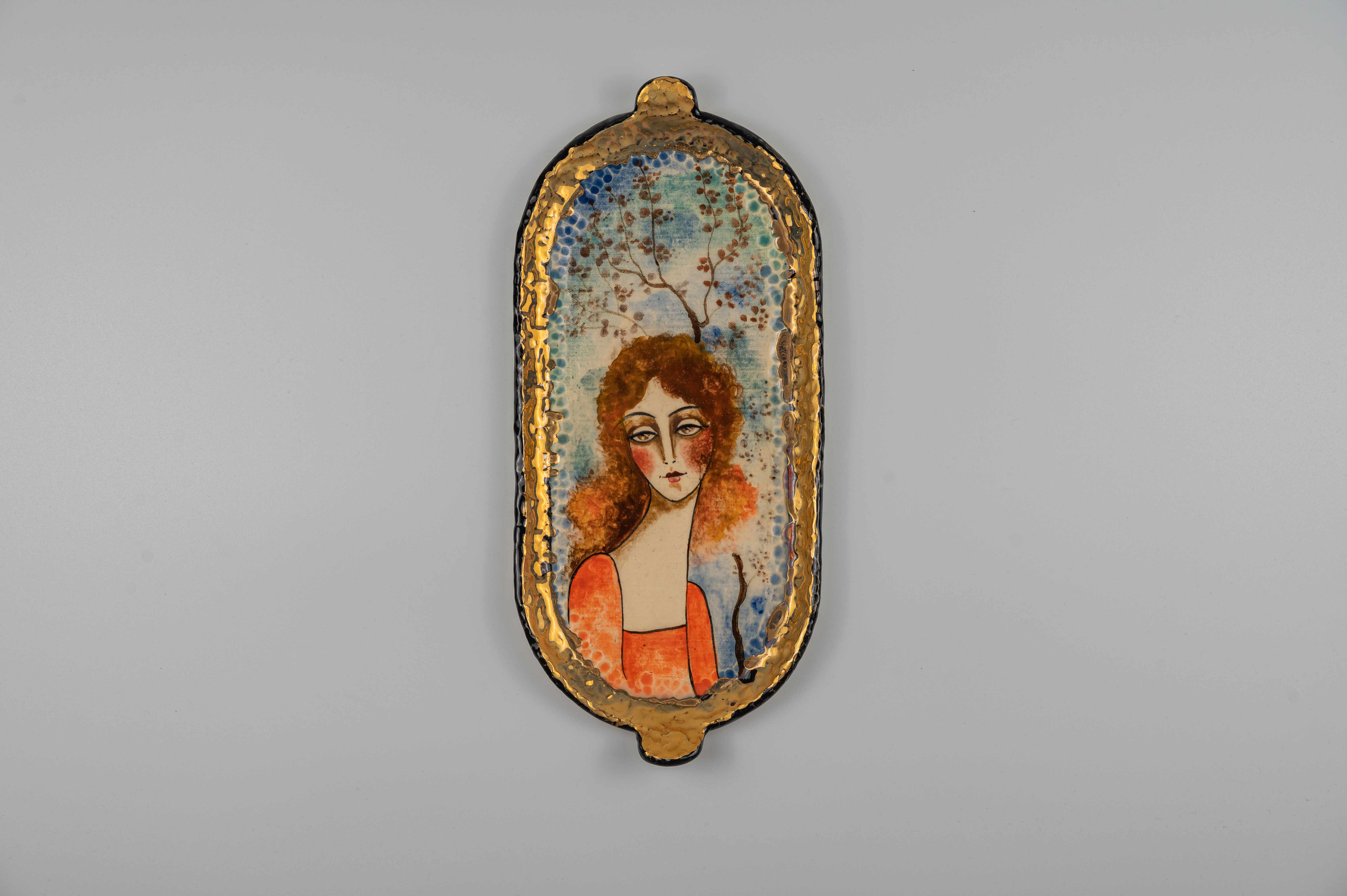 Oval ceramic with portrait and tree