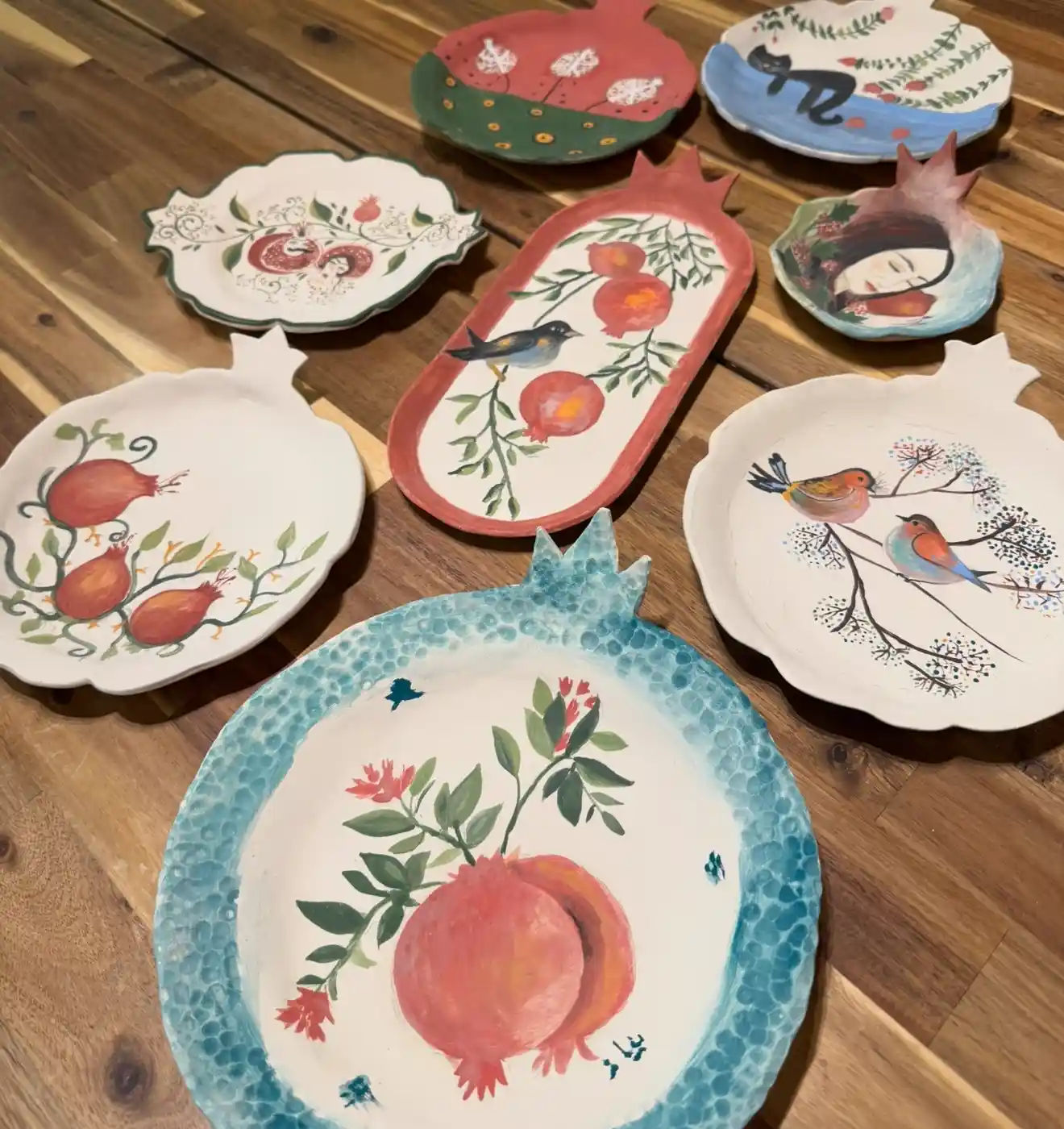 Hand-painted ceramic plates made by students