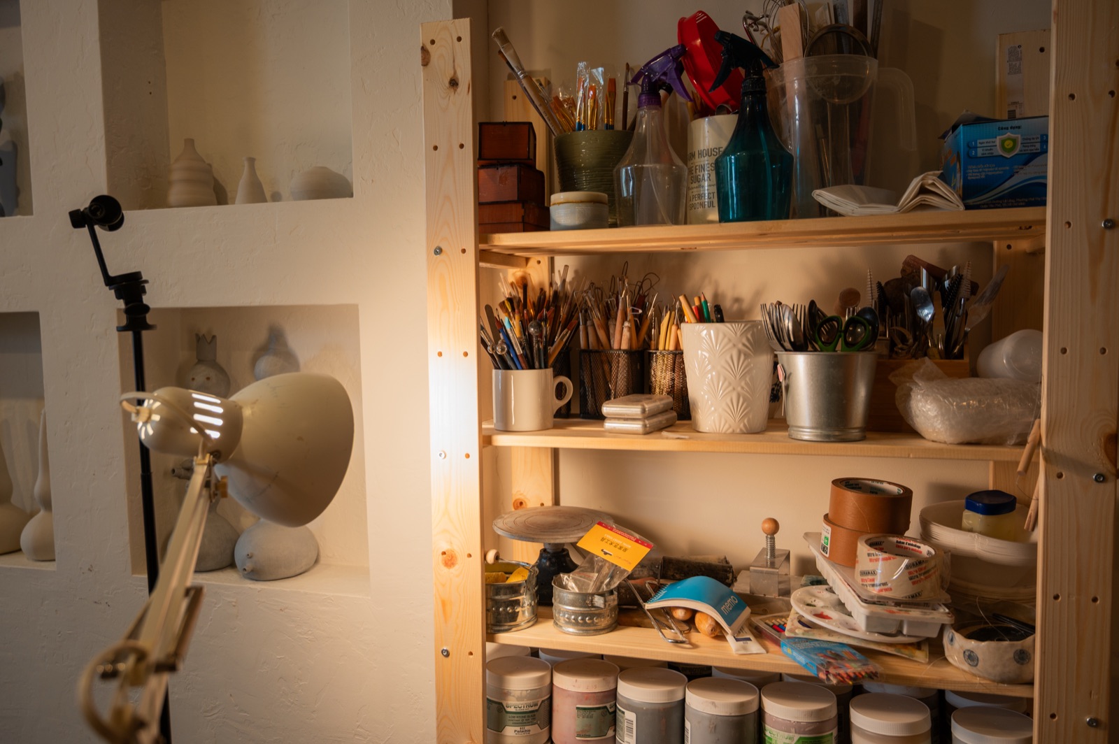 Studio tools, brushes and glazes at Lemarsis Pottery Studio